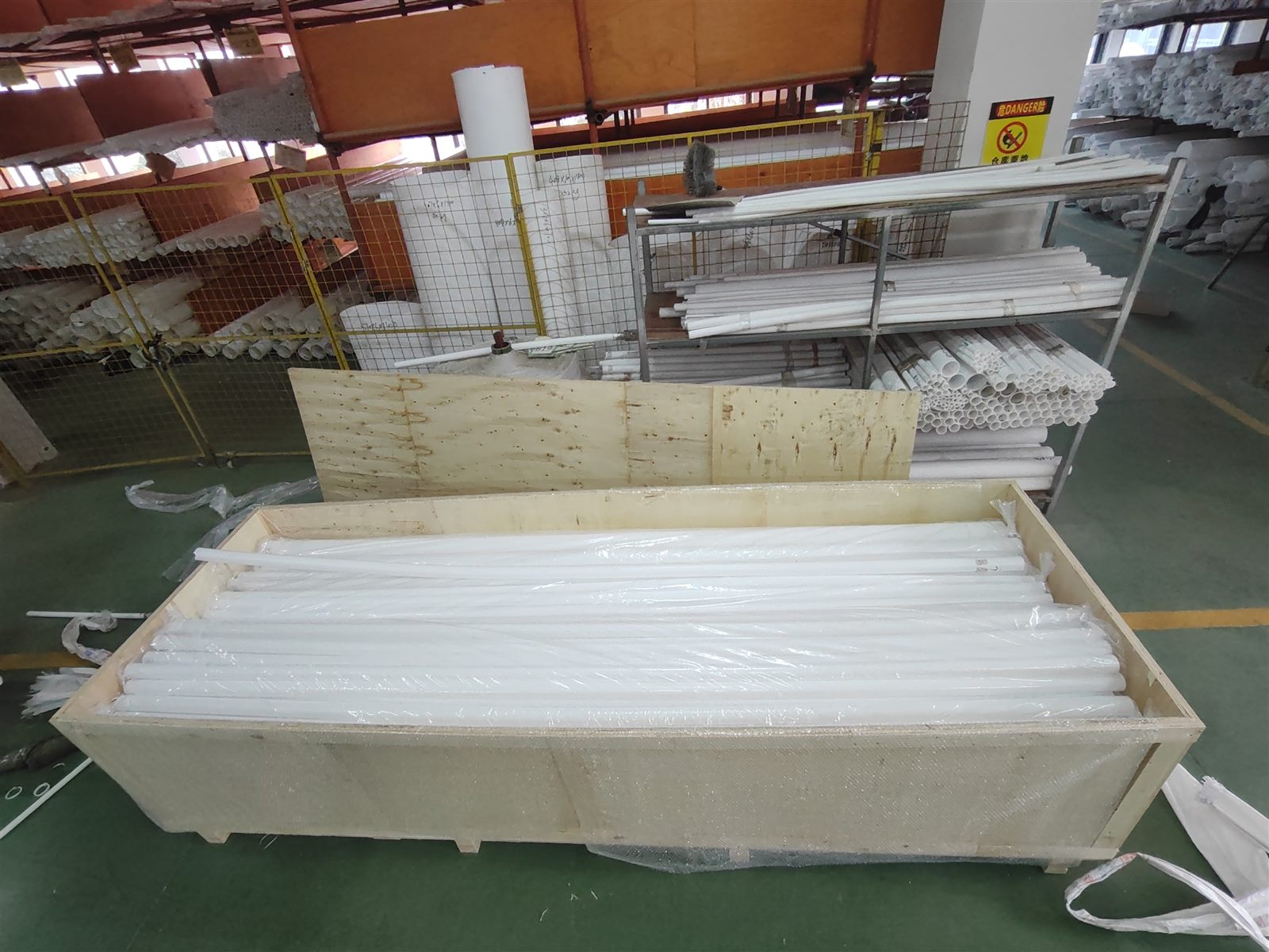 Long PTFE tube and rod stock protected before dispatch