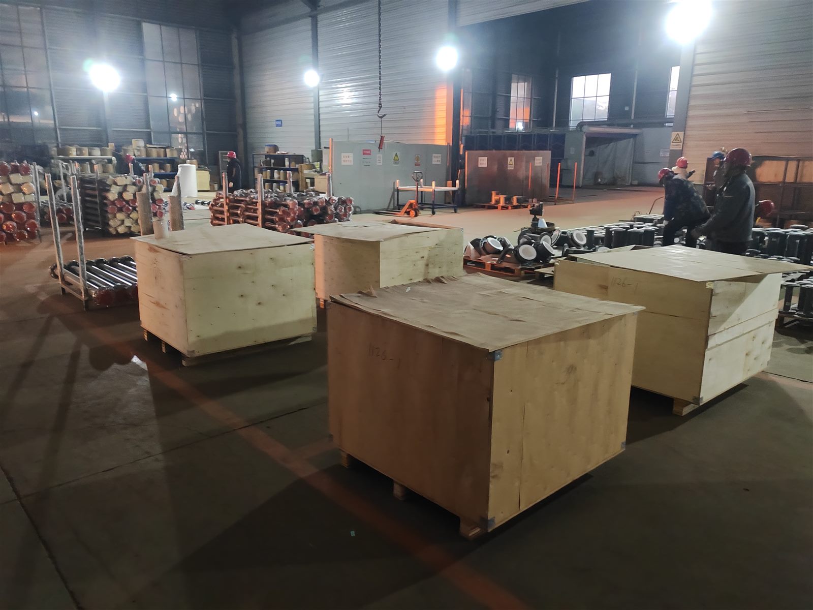 Completed wooden cases staged for shipment follow-up